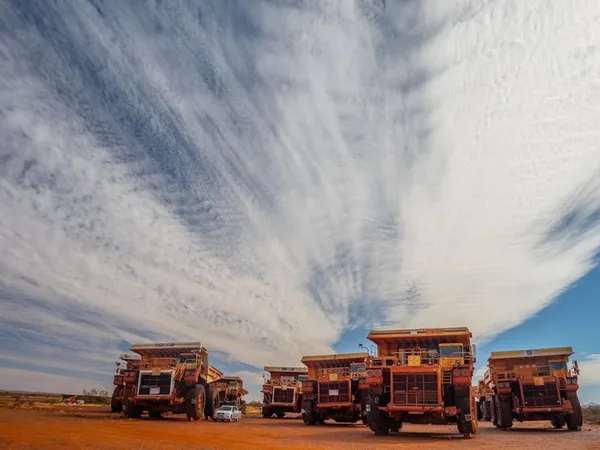 Haul truck and excavator working in an open-pit mine