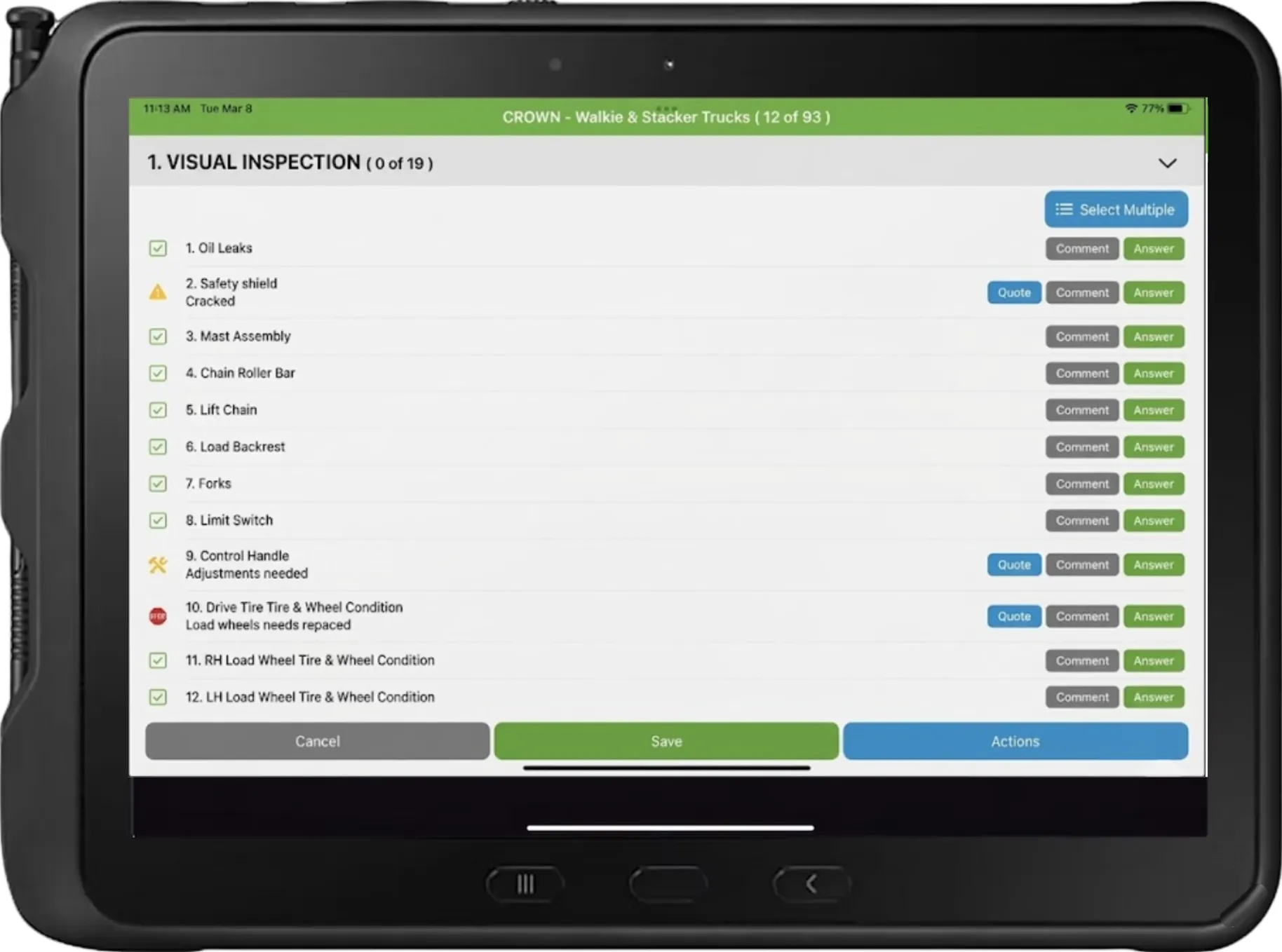 Technician completing an electronic inspection checklist on a rugged tablet